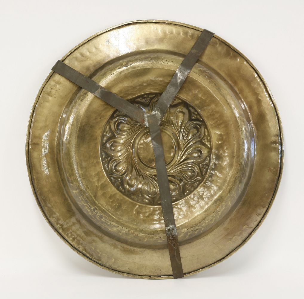 A brass alms dish,Nuremberg, 16th century, the central boss with whorls, partly separated with - Image 2 of 2