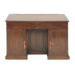 A mahogany architect's desk, 19th century, the base of kneehole form, fitted with three cupboards,