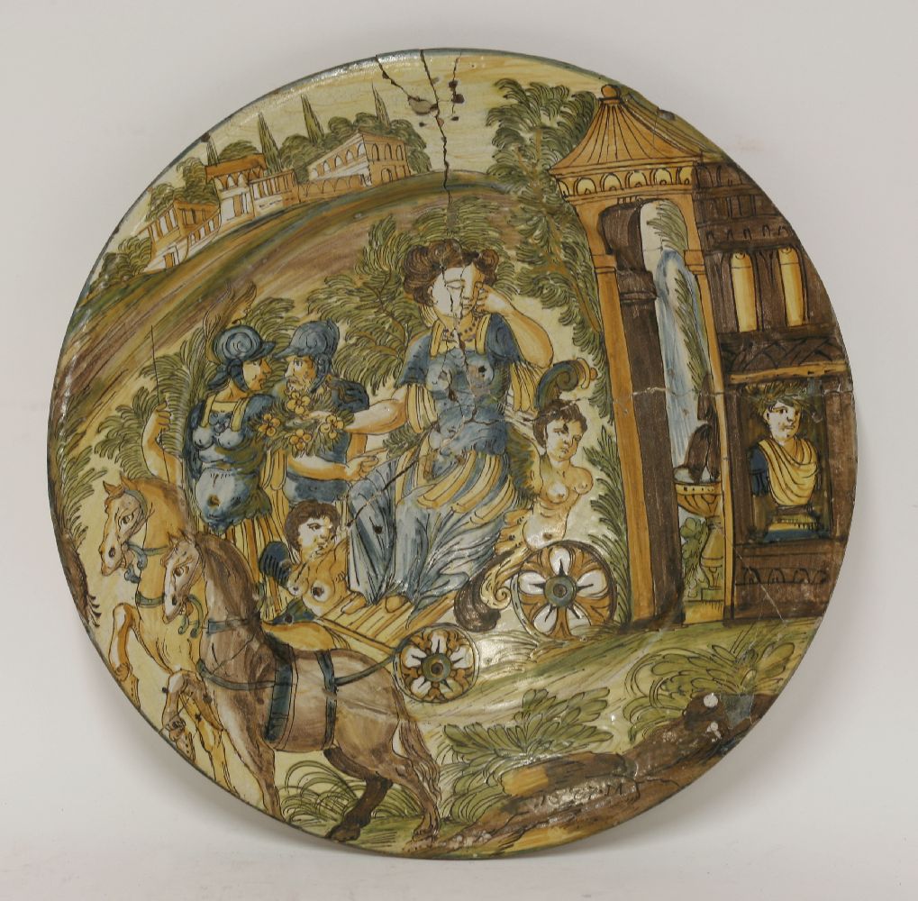 A rare maiolica Dish,Deruta/Savona, c.1700, painted in a palette of pencilled brown and blue,