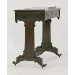 A small rosewood writing table,19th century, the three section leathered top with lift-up centre,