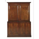 A mahogany collector's cabinet,mid 19th century, the top section with two panelled doors enclosing