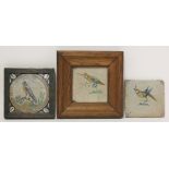 Three various delft Tiles,17th/18th century, each painted with a bird,13cm, framed   (3)