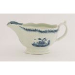 A rare Worcester blue and white Sauce Boat,c.1758-1765, the press moulded body with strapwork and