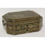 A Chinese export black lacquered workbox,early 19th century, with typical gilt decoration, the
