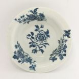 A rare Worcester blue and white Patty Pan,c.1760-1770, printed with four bouquets in the 'Early