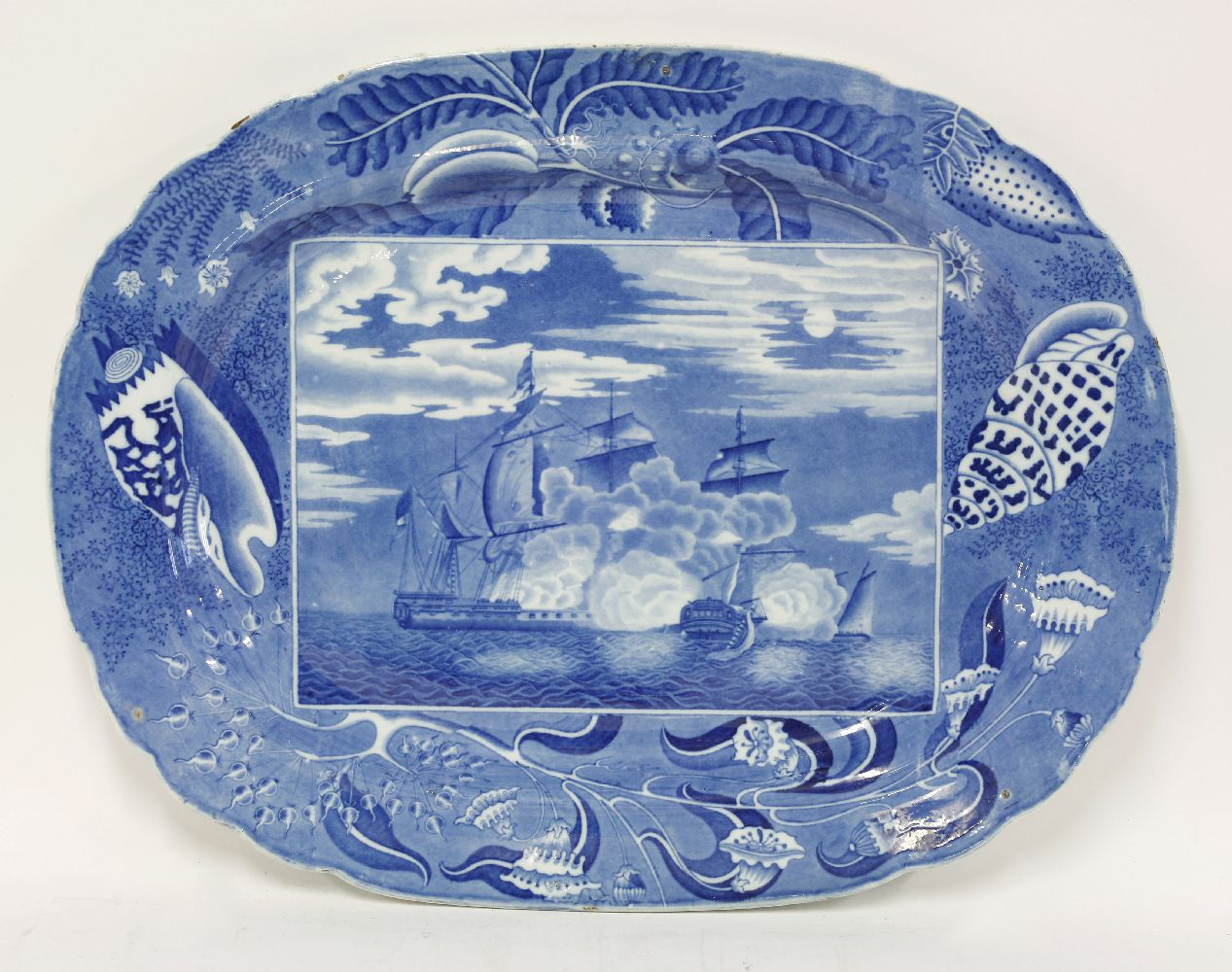 A Victorian blue and white printed Meat Plate,with a scene from 'Shipping Series' and a wide shell