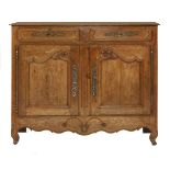 A French chestnut side cabinet,19th century, having two frieze drawers over two panelled doors,135cm