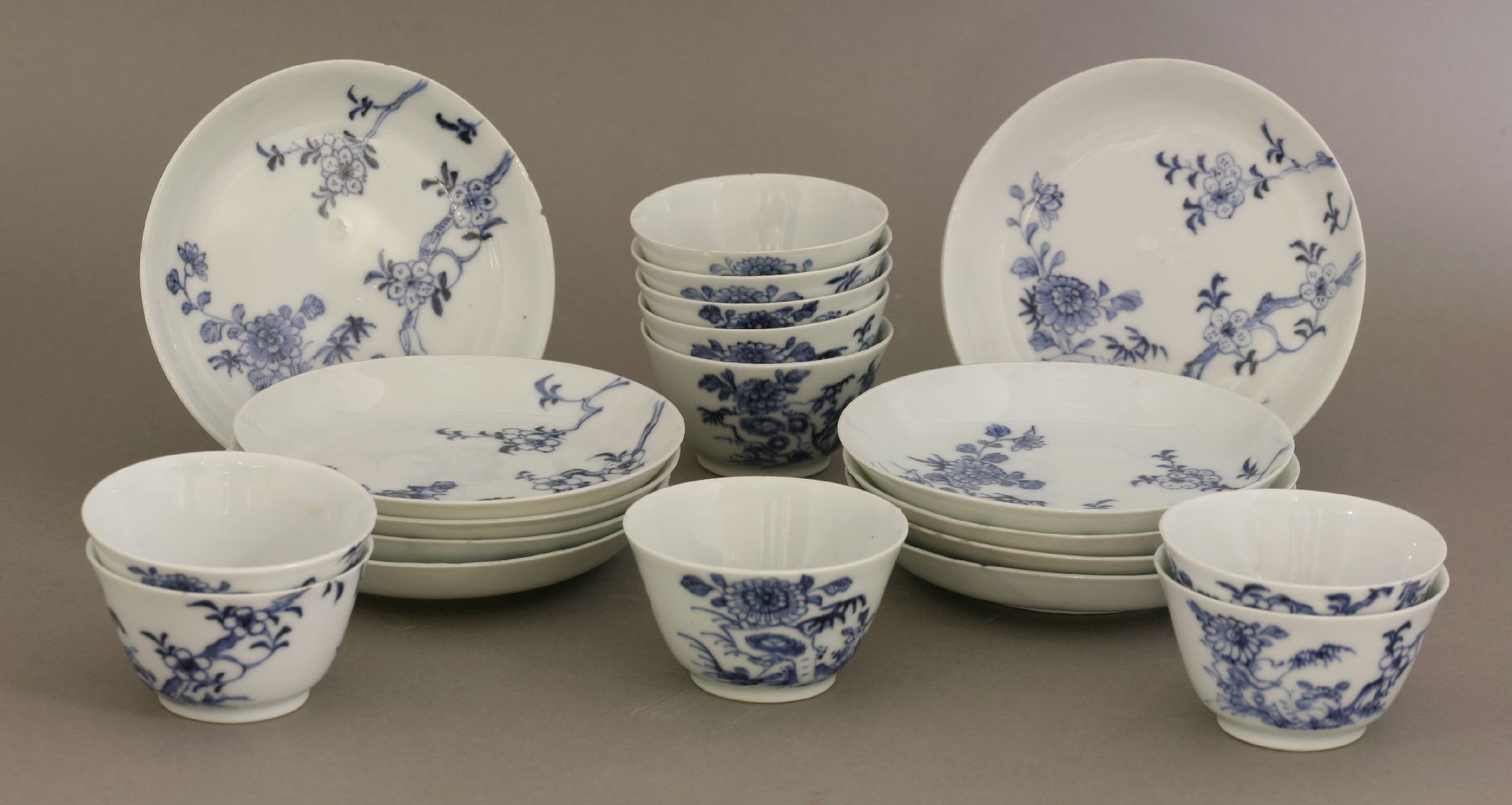 Ten blue and white Tea Bowls and Saucers, mid 18th century, each well painted in underglaze blue