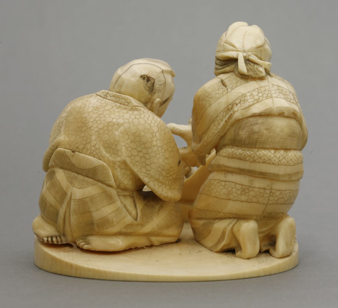 An attractive ivory Okimono, c.1880, of Momotaro, the Peach Boy arising from the fruit watched by - Bild 3 aus 5