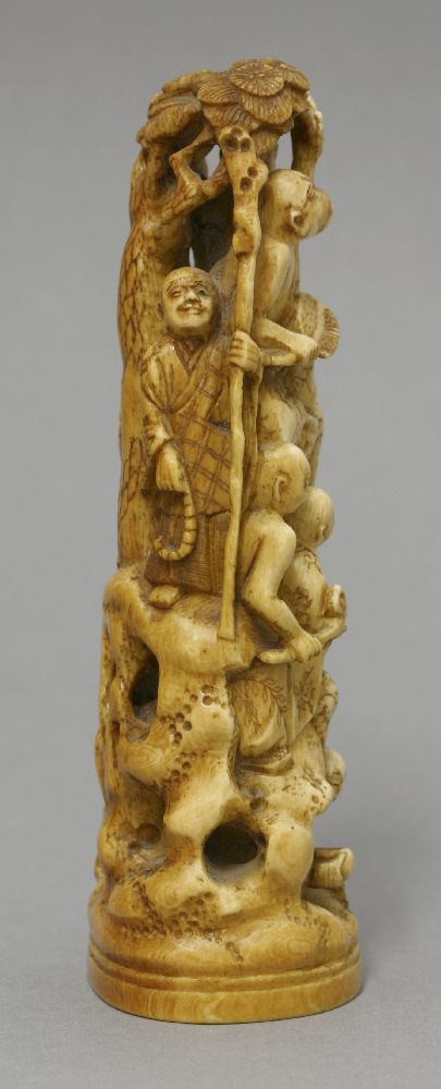 An ivory Okimono, c.1870, carved as eight rakan on a high rock beneath a pine tree, signed Gyokuzan, - Bild 4 aus 5