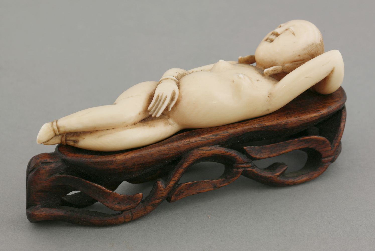 An ivory Doctor's Model, 18th century, the recumbent female, her head resting on her left hand,