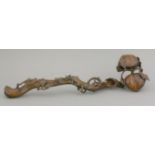 A boxwood ruyi Sceptre, possibly 18th century, intricately carved as two peaches on a gnarled