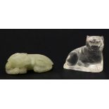 A jade carving, 20th century, of a kylin, the beast crouching with paws and a bifid horn, the