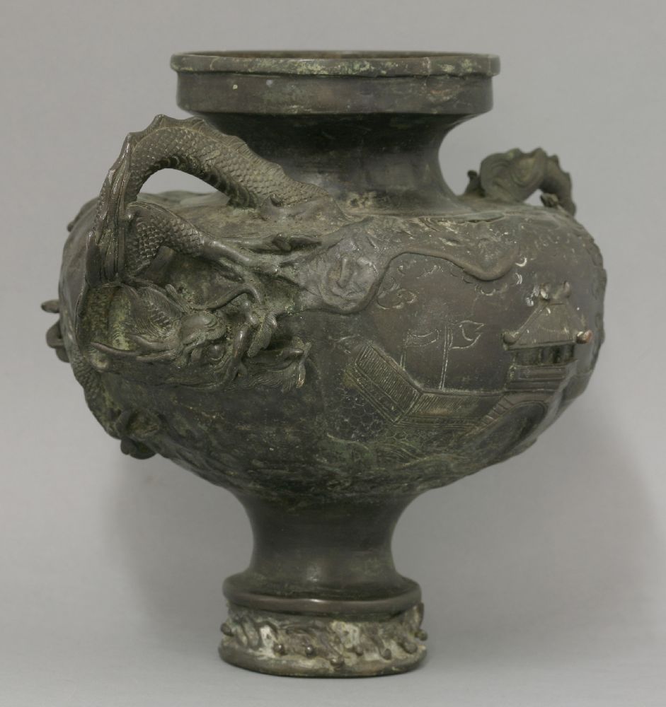 A bronze urn, c.1870, the globular body cast with a gate in a castle, another forming in the sky, - Bild 2 aus 2