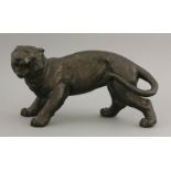 A bronze Tiger, late 19th century, vigorously modelled as a crouching, snarling beast, 26.5cm