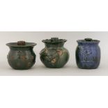 Three Elton 'Sunflower' pottery barrels and covers,one commemorating Edward VII's coronation,