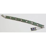 A sterling silver enamel 'ORCADES' bracelet,by Mappin and Webb, Birmingham 1953, a series of