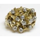 A diamond set bombé form modernist dress ring, c.1960,graduated old European cut, old Swiss cut,