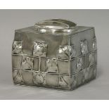 A Tudric Pewter biscuit box and cover, designed by Archibald Knox, of square form, with stylised