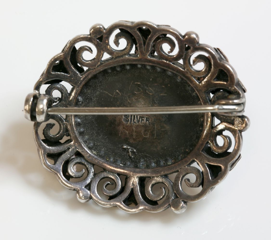 An Arts and Crafts silver and gold, rose quartz brooch,attributed to Bernard Instone, an oval rose - Image 3 of 3