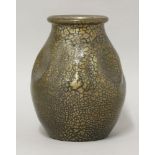 An Elton 'Sunflower' pottery vase,with a gold crackled glaze over a deep blue gound, with pinched