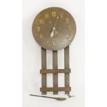 An Arts and Crafts oak wall clock, the circular dial with Arabic numerals, with a striking two fusee