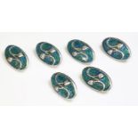 A set of six sterling silver Cymric enamel buttons,by Liberty & Co., oval lightly domed plates