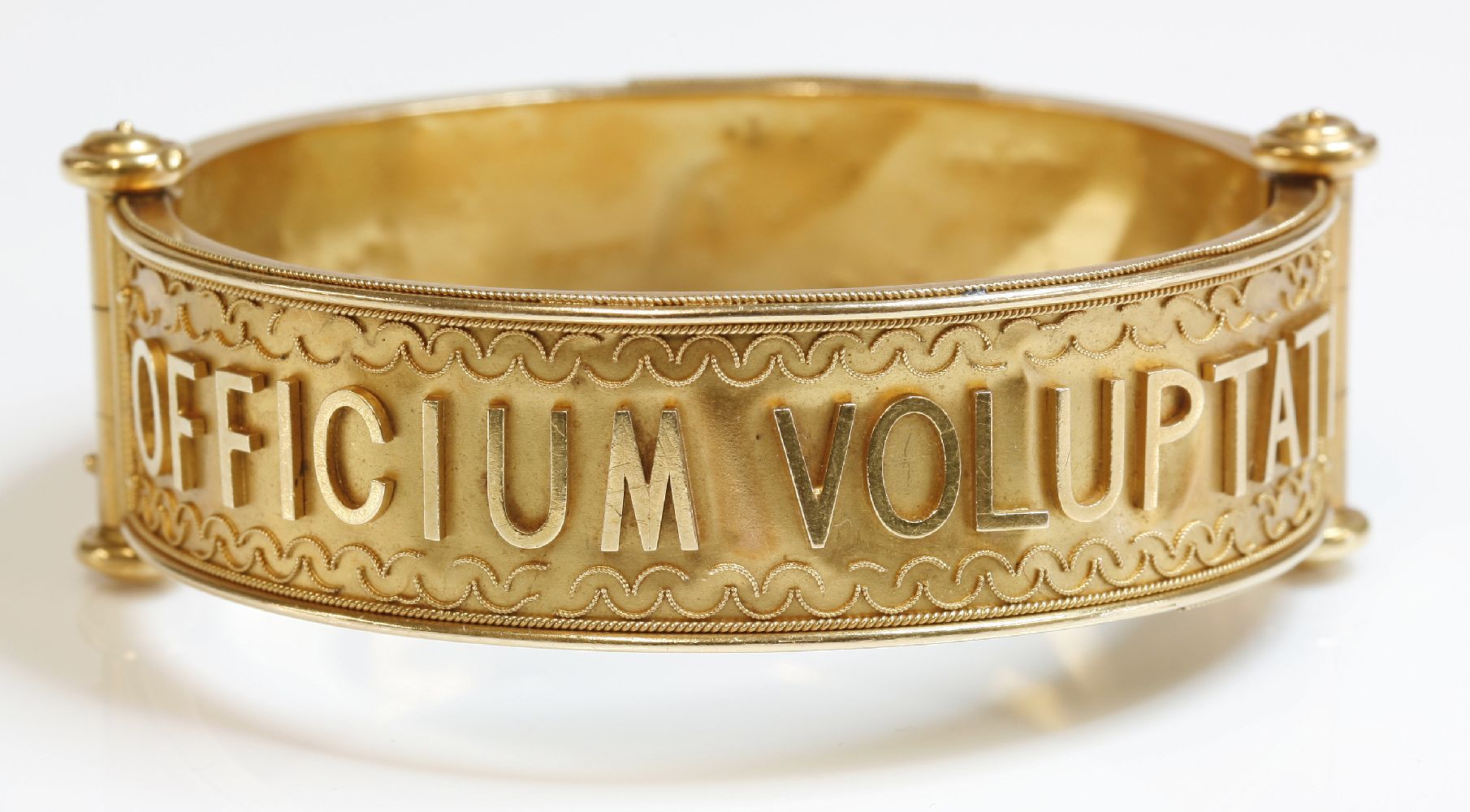 An Italian cased Archaeological Revival gold bangle, c.1870,attributed to Leopoldo Innocenti.  A