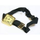 A ladies' Art Deco Valant Watch Co. mechanical strap watch,with cushion shaped case.  Square