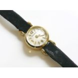 A ladies' cased 18ct gold Jaeger-LeCoultre mechanical strap watch c.1950 , 13.3mm diameter, silvered