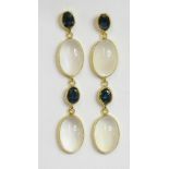 A pair of 14ct gold sapphire and moonstone drop earrings,with oval mixed cut sapphires, rub set in