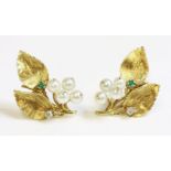 A pair of 18ct gold, emerald, diamond and cultured pearl earrings, c.1960, with screw fittings.