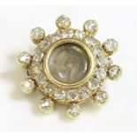 A gold and diamond set memorial brooch,with a circular glazed centre, woven hair below, to a