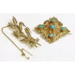 A Victorian lozenge shaped repoussé brooch, c.1840,claw set with five cabochon turquoise, with