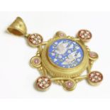 A Victorian micromosaic gold pendant, c.1870,with a raised central boss, with doves of peace to a