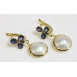 A pair of 14ct gold sapphire and mabé pearl drop earrings,with a trefoil cluster top of three pear