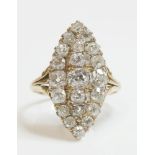 An Edwardian diamond set marquise shaped cluster ring,with graduated old European cut diamonds,