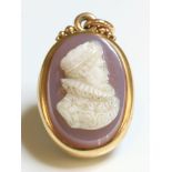 A Victorian double-sided carved hardstone cameo locket,with the carved sardonyx cameo of a