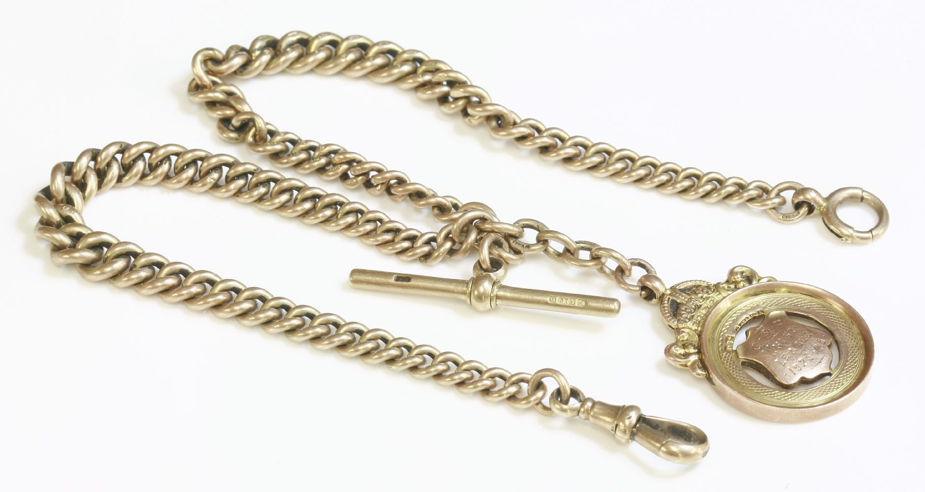 A 9ct gold graduated curb link double Albert chain,with a T-bar, swivel clip, half solid bolt ring
