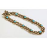 An Edwardian turquoise set gold bracelet,with hollow curb links, alternating longer links, each