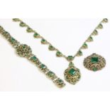 An Austro-Hungarian gemstone and seed pearl matched suite,comprising a silver gilt necklace,