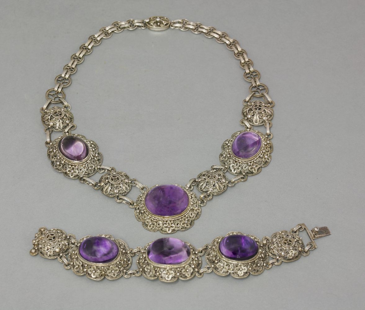 A Chinese silver filigree necklace and matching bracelet, early 20th century, each set with three