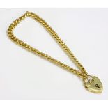 An 18ct gold curb chain bracelet,with a padlock clasp.  Birmingham 1957