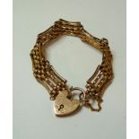 A four row gold gate bracelet, with crimped and waisted links, marked 9c