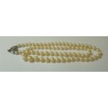 A single row graduated cultured pearl necklace, with a box clasp