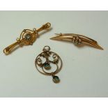 A diamond and split pearl crescent brooch, marked 15ct, an aquamarine bar brooch marked 9ct, and a