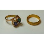 A 22ct gold wedding ring, and a two stone opal triplet crossover ring marked 14