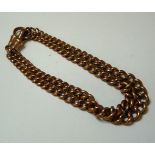 A 9ct gold two row graduated curb chain bracelet