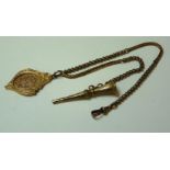 A gold watch chain, with a watch key, and a fob marked 10ct