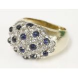 A Continental bombe dress ring, pavé set with cubic zirconia and cabochon synthetic spinels,